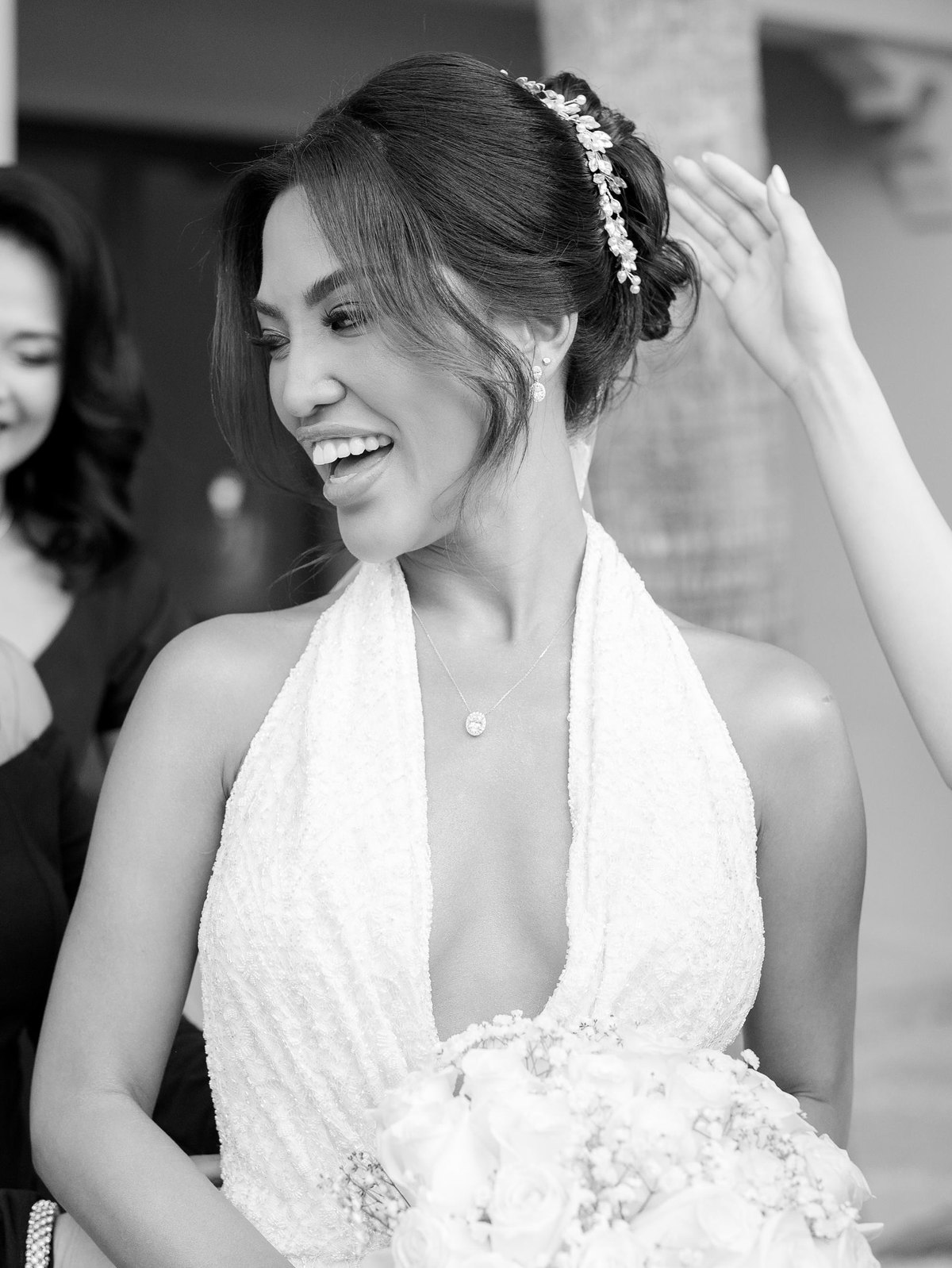 Bride in a bespoke beaded halter wedding gown by Haniye — Dubai bridal couture
